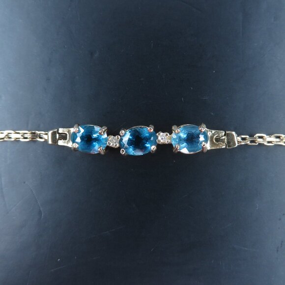 Blue Topaz & Moss Aquamarine Bangle Bracelet – Eliza Page Aquamarine (Blue Topaz) Gold Bracelet